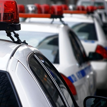 Police Vehicles Parked In Line