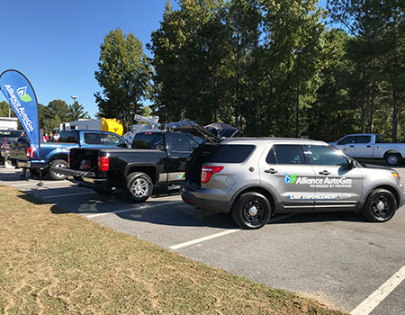 Three Alliance AutoGas Vehicles Featured in Parking Lot