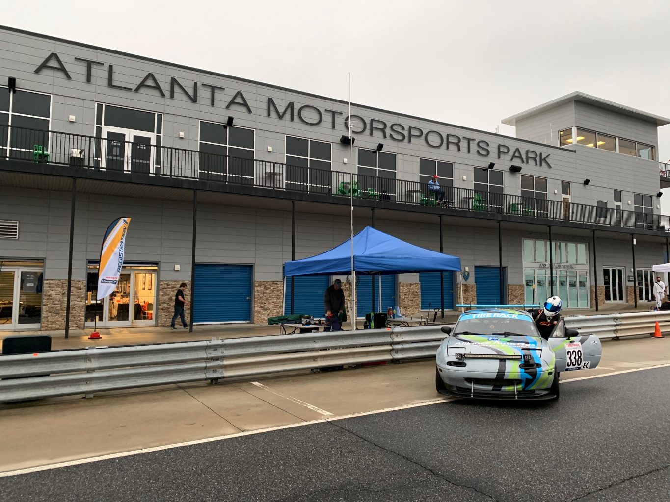 Alliance AutoGas Race Car at the Atlanta MotorSports Park with Race Car Driver entering vehicle