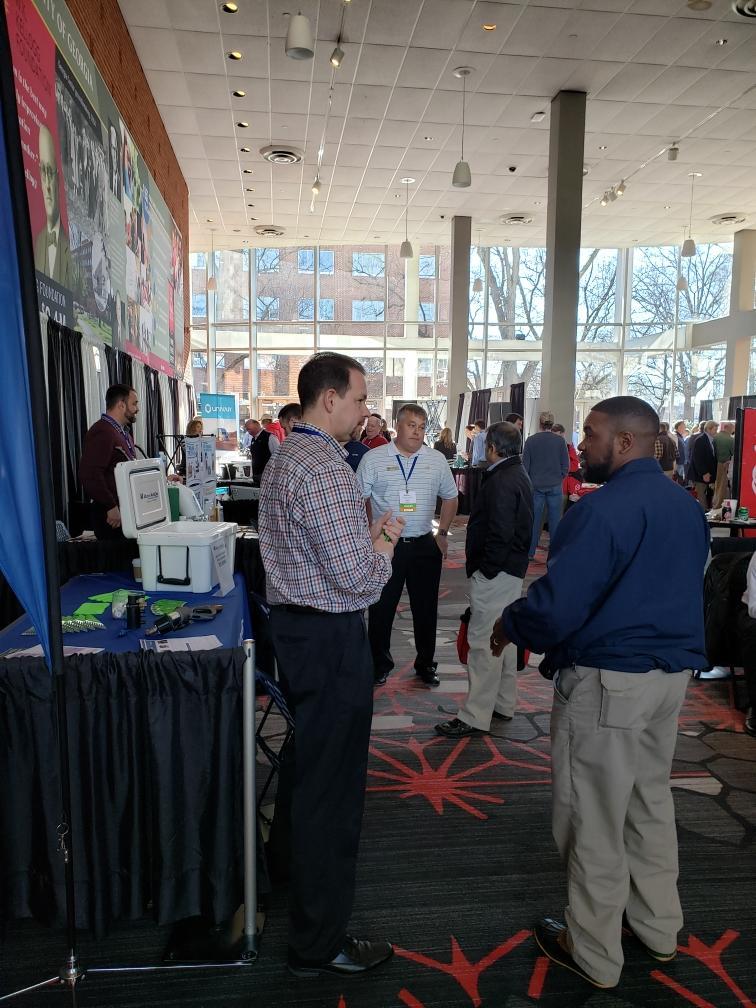 Alliance AutoGas team member displaying autogas booth and educating Georgia Pest Control companies on alternative fuels.