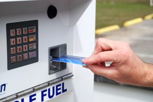 Man using Triton Dispensing Cabinet Fuel Card System