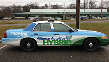 Historical Image Of Older Vehicle Wrapped In Alliance AutoGas Branding